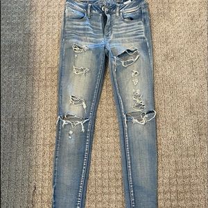 Ripped light-wash American Eagle skinny jeans